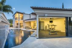 5 Grenoble Place Ormiston QLD 4160 Set on a gigantic 1,888m2 block with a prime north east aspect and a huge 24.5m approx quayline, this incredible waterfront mansion is approx 130sq under roof. The detail and level of finishes in this home is like nothing ever seen in the exclusive Raby Bay estate. Set amongst multi-million dollar homes this vista stands tall above all others; enjoying the position it has commanding views down the main canal which is the widest canal in the estate and looks back across nearly 10 acres of parklands as well. The near 14m pontoon will take care of your yacht and the 5 car garage will house your collection of vehicles. 1,000 bottle wine cellar (climate controlled), a wet bar that even the Versace Hotel would be proud of and a 2 tier full cinema room will entertain the family all year round - only the finest inclusions have been used within the home; this truly is an absolute masterpiece. Waterfront terraces so large you can entertain 5 families, floor to ceiling glass wall from the gymnasium gives you the perfect outlook over the resort style pool and adjacent to the gym is a full sauna and steam room. Vaulted high ceilings are both dramatic and incredible whilst the curved staircase itself is a feature very few designers could re-produce. When we talk luxury, nothing will surpass the master suite at 5 Grenoble Place. This is a room straight from a presidential hotel suite. The craftsmanship, size, space and inclusions that the ensuite and walk in robe offer has no comparison. This is one of the most impressive and luxurious rooms I have ever seen in 20 years of selling waterfront Real Estate in the Bayside. * Multiple ensuited bedrooms throughout * The home can be sold with furniture or not * So carefully and meticulous was the construction of this home that it took over 2 years to complete, but I can promise you it was worth the wait 5 GRENOBLE PLACE, ORMISTON/RABY BAY - THE MOST IMPRESSIVE WATERFRONT MANSION IN THE ENTIRE RABY BAY ESTATE. COME AND SEE IT FOR YOURSELF. 
