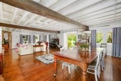  1 Throsby Park Road Moss Vale NSW 2577 $2,350,000 A truly unique piece of Highlands history, The Mill is an original, Cornish cottage which sits on eight and a half magnificent acres, just a stone's throw from Moss Vale village. An ideal location and venue for a modern business opportunity, secluded from neighbouring properties. Massive 600mm thick brick walls, open fireplaces, English timber-panelled windows, polished timber floors and exposed ironbark beams throughout, all features characteristic of the era. Boasting a superb northern aspect at the rear and pretty vistas across the acreage, its striking features include a generous, covered balcony with wisteria-shaded balustrade off the bedroom wing, and a sandstone courtyard below. Originally a working mill, and then operated as a Red Cross hospital for returning WW1 soldiers, the charming property has been more recently operated as a Licensed B&B. The emotive setting offers the perfect forever home or alternatively, an ideal investment opportunity for its new owner as a holiday rental, wedding venue, boutique country hotel, or whatever you envision! (S.T.C.A) THE RESIDENCE - 3 LEVELS * 4 - 5 bedrooms. French doors to verandah * 2 bathrooms - claw foot bath in main * Open plan lounge and dining with open fire & built-in bookcases. French doors to sandstone terrace and garden * Library / sitting room. French doors to verandah * Entrance foyer * Reading room * Country style kitchen with Arga cooker (electric & gas) slow combustion stove and Miele dishwasher * Laundry with old fireplace, boiler, separate w.c. Exterior access. * Large loft covering the entire floor area INFRASTRUCTURE * 4 stables with yard * Paddocks * Slab hut (built in the depression) * Large chook pen & house * Full size tennis court * Newly built shed with bathroom, option to convert to a secondary dwelling (S.T.C.A) * Creek * Town water and town gas FEATURES: Built-In Wardrobes Close To Schools Close To Shops Close To Transport Fireplace(S). 