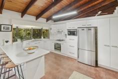  11 Sandpiper Place Aroona QLD 4551 $799,000 This is a stately brick residence on a large secluded block, offering room to move plus truck, boat, caravan storage if required. Good glimpses of the ocean and lush green landscaping provide the backdrop to comfortable, spacious living. This is the one that you have been waiting for to call home.  This residence is only a 760 metre stroll to the Aroona local shopping centre .  Consisting of: Four bedrooms, one of which is on the lower level and is complimented with a separate bathroom, this could be used as a separate living facility, this bedroom opens onto the lower balcony The upper level three bedrooms are all spacious with built in cupboards to the master, ensuite plus large his & her wardrobes, this bedroom opens onto a wide balcony. Design features high raked, timber ceilings with exposed beams in the living, kitchen and family rooms, which are all tiled. The rear balcony, which joins all living areas, is 2.9 metres wide x 21 metres in length. A covered deck at the main entry on the east elevation is complimented by a fully landscaped front garden. The kitchen offers abundant bench space and extensive storage. Air-conditioning in the main living area which is complemented by ceiling fans throughout Security screens throughout. Two lock up garages plus vehicle cover under the Southern deck. The property has an area of 311m2 plus a dry 80m2 storage area on the lower level. The block is completely fenced and landscaped. 