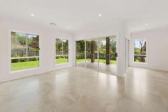  21A High Street  Mount Kuring-Gai NSW 2080 Indulge yourself with this large brand new beautiful custom built brick home on a generous 800 approximate square metre property. Meticulously appointed throughout and finished with countless upgrades inside and out. North to rear aspect thats been extensively and functionally landscaped for the present and the future, with further potential to built a granny flat with driveway access and/or a large pool (STCA) and all located within a short walk to Mount Kuring-gai railway station, local primary school, Aldi supermarket, shops, parks and playgrounds. Inspect at the next open by calling to arrange an inspection, as this property is sure to please! Property features: High 2.75 metres ceilings to ground floor and 2.45 metres upstairs Large walk-in pantry and dishwasher in open plan kitchen Large 900mm range cooker/oven and Caesarstone bench-tops Diamond upgrade package (full list available) Quality large format imported floor tiles from United Arab Emirates Quality carpet upstairs and feature light fittings through-out Walk-in-robes to 3 of the 4 bedrooms and built-in-robe in one 3000 Litre rainwater tank and large undercover alfresco area R3 insulation to ceilings and R2 insulation to external walls Reverse-cycle ducted air-conditioning with 2 zones Large 340 litre hot water system with 2 solar panels Hills Security alarm system with 1 keypad & 6 sensors Large double auto garage with workshop/storage area Remaining period of the structural and non-structural warranties Location features: 5 minutes walk to railway station, local primary school and community centre 7 minutes walk to Local shopping centre, ALDI supermarket & local park and playgrounds 10 minutes drive to Hornsby Westfield, Hornsby Railway Station and local Waterways. 