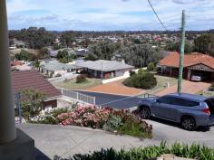  18 Geographe Way  Withers WA 6230 $340,000 > Very impressive home near beach and Tuart reserve. > Well built 4x2 constructed 2000 with floor plan available on request. > Views for miles from main bedroom, lounge, family and kitchen areas. > Tasteful decor throughout with pleasant neutral tones and leadlight entry statement. > 2 good size living areas with room for a large dining table. > Excellent natural lighting in all areas. > Split reverse cycle air conditioning in living area. > Brand new family size hot water system for new owners. > Security doors and screens with new auto door on carport for additional privacy. > Large powered garage/workshop with easy access through high roof car port. > Attractive paving on all sides of home. > Figs, lemon, grapes and room for your organic garden or more trees. > New reticulation to all three lawn areas. > Freshly painted eves and gutters > Easy parking off main drive. > Enjoy the benefits of being only minutes from schools, shopping, sport, hospital, uni, beautiful beach or city. > Glen Padden is a great place to live....just ask the neighbors. 
