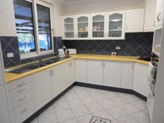  54 ALMERIA PARADE UPPER SWAN WA 6069 $645,000 Set on almost 1/2 an acre in a secluded location this spacious 3 bedroom plus study rendered brick and tile home would suit a growing family and is ready to move into. Roomy kitchen with gas hot plates and electric wall oven,formal dining, huge sunken lounge with split reverse cycle air conditioner and cozy wood heater, built-in robes to all bedrooms, ducted evaporative air conditioning, very large family games room leading out onto a full length patio area with built in bbq and double glazed windows. solar hot water system, a 9.6 x 8 metre workshop with 3 phase power, a wood fired heater and connecting carport and storage area and established easy care gardens. With a wide driveway down one side and the workshop located towards the rear of the property there is lots of room for a large caravan or a truck. 