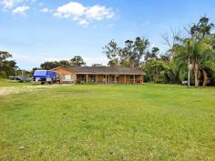  17 Major Mitchell Drive Gulmarrad NSW 2463 $469,000 If you have a need for extra space, then this five bedroom house is certain to get your attention. There is plenty of room for all the kids plus the two bedrooms to the western end of the house are perfect for a teenagers retreat or to bring mum and dad along. The generous sized, tiled lounge will please as there is plenty of space for to spread out in a comfortable layout. The well-appointed kitchen will appease the fussiest cook with its ample bench space, electric cook-top, wall oven and dishwasher. To one side of the kitchen, the dining area is large enough for entertaining and leads to a cosy sunroom which will be the perfect spot to relax with a good book. To the other side of the kitchen, the breakfast nook is a convenient space and then leads to the rear patio. The three bedrooms to east end of the house are all very generous in size with great storage in the large built-in robes. All bedrooms are equipped with ceiling fans for extra comfort. The main bathroom is well equipped with bath, shower plus separate vanity and loo. The generous space in the linen closet will ease your concerns. To the western end of the house, the combined second bathroom and laundry also provide access to the 4th & 5th bedrooms which are deep and spacious and have ceiling fans. The front and rear covered patios provide great outdoor options to follow the sun or stay in the shade. The additional depth in the rear patio provides ample space for a BBQ and good sized outdoor setting to entertain friends and family. Being a corner block the house is set near the middle of the block which provides great, level yard space all around the house plus the established trees around the fence line provide additional screening from neighbouring properties. The generous living areas in the house are a feature and there is plenty of opportunity to put your own touch on this property and make it unique and special for you. Located approximately 600 mtr from the Gulmarrad Primary School plus a short 5-10 minute drive to Maclean or approx. 15 minute drive to the pristine beaches of Brooms Head or Yamba, this is the perfect location to enjoy coastal living on small acreage. 