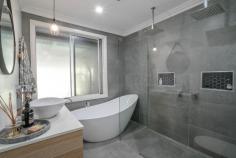  6 Murray Street Eleebana NSW 2282 $655,000 - $695,000 This sensational family home with northerly aspect has been totally refurbished with all the modern comforts that you deserve. If you think it looks great on the outside, you will be blown away on what's inside. From the formal entry right through to the extra-large alfresco entertainment area nothing has been spared. Floating timber floors and air-conditioned comfort in the living areas, soft quality carpets in the three bedrooms and the multi-purposed room downstairs plus modern shutters and venetians.  Well there are kitchens and then there are kitchens. This one steals the show with a generous island bench, stainless steel appliances, soft close cupboards and draws and is the focal point of the home. It has easy access to the extra-large alfresco for fun with friends and a casual dining for family dinners. If that's not enough the vogue bathroom looks like its straight out of a glossy magazine and will blow your socks off.  Nestled on a near level kid-safe block it's the perfect spot to raise a family. Great garaging for three cars or even that boat you've always wanted as its only 600m to the boat ramp.  