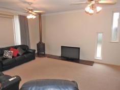  54 ALMERIA PARADE UPPER SWAN WA 6069 $645,000 Set on almost 1/2 an acre in a secluded location this spacious 3 bedroom plus study rendered brick and tile home would suit a growing family and is ready to move into. Roomy kitchen with gas hot plates and electric wall oven,formal dining, huge sunken lounge with split reverse cycle air conditioner and cozy wood heater, built-in robes to all bedrooms, ducted evaporative air conditioning, very large family games room leading out onto a full length patio area with built in bbq and double glazed windows. solar hot water system, a 9.6 x 8 metre workshop with 3 phase power, a wood fired heater and connecting carport and storage area and established easy care gardens. With a wide driveway down one side and the workshop located towards the rear of the property there is lots of room for a large caravan or a truck. 