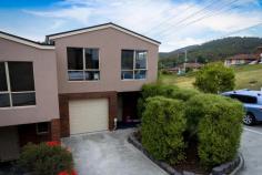  4/4 Nagle Place Glenorchy TAS 7010 $345,000 The Summary • Stylish 2 storey, 3 bedroom, 2 bathroom townhouse • Open plan living, kitchen and dining • Master bedroom with walk in robe, en-suite and private balcony • 2nd bedroom with walk in robe, 3rd with built in storage • Shared walk through bathroom • Study nook off stairs • European style laundry • Additional washroom downstairs • Single, internal access garage with remote roller door • Private backyard • Currently let to terrific tenants who keep the place immaculate The Story It may not be immediately self-evident but this 3 bedroom 2 & ½ bathroom townhouse packs more value than you might expect looking at it from street level. 4/4 Nagle Place is set over 2 floors, the first floor featuring all of your living comforts with an open lounge, dining and kitchen area. It sets the stage for you to kick off your shoes, place your unwanted work uniform in the European style laundry and launch yourself onto the couch after a long day. Or perhaps a more refined style of entry is preferred through the internal access from the garage. Oh yeah, and it might be easily missed on a quick walk through however downstairs features its own washroom as well so no arguments or stressful morning runs required. Upstairs features 3 bedrooms and 2 bathrooms, all with built in storage and the master is accompanied by its own en-suite, walk through wardrobe and private balcony in case you have to escape the rest of the household. It may not seem much, however, there is also plenty of space just off the stairs to create a small little central study if need be. The townhouse itself is set within a complex of 8 and is professionally managed meaning the upkeep of the complex is first class but not all has to be shared as you have your own private backyard to enjoy as well. With everything Glenorchy City has to offer only minutes drive away, be it buying your first home with options to privately lease a room or two, or lease out completely, this is a terrific option for a simple and no fuss lifestyle. 
