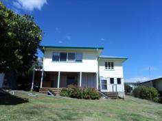  12 Hume Street Boonah QLD 4310 $275,000 Highset Three Bedroom Home with views The home has carpet & polished flooring Open plan living with kitchen and family Kitchen has electric stove plus dishwasher Interior has been freshly painted Downstairs: Entertaining & Storage Area Rear deck to take in the views 9m x 7m Iron shed at the rear of property Currently tenanted 