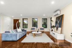  1/4 MOUNTAIN ASH AVENUE ASHWOOD VIC 3147 A brand new street-front town residence has become available in Ashwood showcasing luxurious proportions, sublime finishes and exceptional functionality.  Encompassing elements and carefully considered details, this residence provides a unique dual zoned layout flowing from a light-filled lounge, a spacious open plan living/dining zone and high-end galley-style kitchen boasting stone surfaces, Bosch appliances and walk-in pantry.  Enjoy the versatility of ground floor and first floor main bedrooms, each with a designer ensuite, complemented by 2 further robed bedrooms, teenage retreat and stylish fully-tiled bathroom. Split system heating/AC, powder room, alarm system, video intercom, timber floors, entertaining courtyard and double garage are amongst the additional assets of a home certain to establish a new benchmark.  Located for lifestyle convenience, close to Ashwood College, Parkhill Primary, Gardiners Creek parkland, Ashburton Village, Chadstone Shopping Centre and transport. 