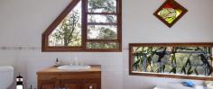  105 I-ridge Road Kiora NSW 2537 $645,000 "Naveen" - 28 Acres of natural beauty. Surrounded by 100s of acres of natural bushland and with amazing mountain vistas, this property certainly offers the serenity that is often sought but seldom found. A self-sufficient lifestyle and yet only minutes’ drive from Moruya. A causal walk will take you to the spectacular Deua National Park and river where you can have a picnic, a swim or relax and enjoy the quietness of the area. Main House – The Dome House aka The Tree House – two good sized bedrooms, combined bathroom & Laundry, kitchen and open plan lounge/dining area and wrap around deck. Cooking and fridge are both gas. Studio – 1 bedroom, lounge, combined dining/kitchenette, separate bath/toilet across the walkway and a study. Solar power with batteries, lots of rain water tanks, pumps, worm farms, covered vegetable gardens, orchard, plus much more. The property is chemical and pesticide free. Household scraps are recycled through the worm farms and gardens. Other notable features include two carports, shipping container, land rates are approx. $800 per year, phone line and mobile wi-fi. You may feel like you are a million miles from anywhere but there is a Taxi service available, school bus pick up from just down the street and the property is only eleven kilometres from the main Moruya roundabout. Many species of wildlife visit the property including wallabies, birds and possums. This has been a permanent home to the current owner and would make a great permanent home again but equally this would be an ideal weekend retreat for those looking for a peaceful location & some escapism with no energy bills to be worried about and the real potential for rental return. 