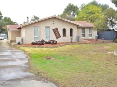  54 ALMERIA PARADE UPPER SWAN WA 6069 $645,000 Set on almost 1/2 an acre in a secluded location this spacious 3 bedroom plus study rendered brick and tile home would suit a growing family and is ready to move into. Roomy kitchen with gas hot plates and electric wall oven,formal dining, huge sunken lounge with split reverse cycle air conditioner and cozy wood heater, built-in robes to all bedrooms, ducted evaporative air conditioning, very large family games room leading out onto a full length patio area with built in bbq and double glazed windows. solar hot water system, a 9.6 x 8 metre workshop with 3 phase power, a wood fired heater and connecting carport and storage area and established easy care gardens. With a wide driveway down one side and the workshop located towards the rear of the property there is lots of room for a large caravan or a truck. 