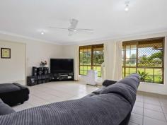  17 Major Mitchell Drive Gulmarrad NSW 2463 $469,000 If you have a need for extra space, then this five bedroom house is certain to get your attention. There is plenty of room for all the kids plus the two bedrooms to the western end of the house are perfect for a teenagers retreat or to bring mum and dad along. The generous sized, tiled lounge will please as there is plenty of space for to spread out in a comfortable layout. The well-appointed kitchen will appease the fussiest cook with its ample bench space, electric cook-top, wall oven and dishwasher. To one side of the kitchen, the dining area is large enough for entertaining and leads to a cosy sunroom which will be the perfect spot to relax with a good book. To the other side of the kitchen, the breakfast nook is a convenient space and then leads to the rear patio. The three bedrooms to east end of the house are all very generous in size with great storage in the large built-in robes. All bedrooms are equipped with ceiling fans for extra comfort. The main bathroom is well equipped with bath, shower plus separate vanity and loo. The generous space in the linen closet will ease your concerns. To the western end of the house, the combined second bathroom and laundry also provide access to the 4th & 5th bedrooms which are deep and spacious and have ceiling fans. The front and rear covered patios provide great outdoor options to follow the sun or stay in the shade. The additional depth in the rear patio provides ample space for a BBQ and good sized outdoor setting to entertain friends and family. Being a corner block the house is set near the middle of the block which provides great, level yard space all around the house plus the established trees around the fence line provide additional screening from neighbouring properties. The generous living areas in the house are a feature and there is plenty of opportunity to put your own touch on this property and make it unique and special for you. Located approximately 600 mtr from the Gulmarrad Primary School plus a short 5-10 minute drive to Maclean or approx. 15 minute drive to the pristine beaches of Brooms Head or Yamba, this is the perfect location to enjoy coastal living on small acreage. 