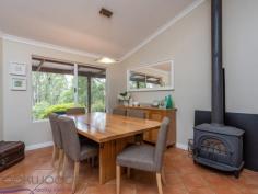  13 Clipson Crescent Mundaring WA 6073 $549,000 Cosseted in an iconic Hills landscape, this bright and light 3 bedroom, 2 bathroom, plus study home is a Noblewood Estate treasure. Tranquil views, a soft-grey façade and the use of recycled materials give the property an aura of serenity. Raked ceilings, open-plan living and a northern aspect, infuse the home with beautiful light. Outdoors, a long, shady verandah overlooks the natural, 2,573sqm block and decked above-ground pool. With a paved driveway, large shed and sought-after address, this home is a private delight. 3 bed, 2 bath plus study 1997 Ross Squires home Light-filled open-plan Great kids’ activity room Decked swimming pool Wisteria strewn pergola Paved driveway carport Private 2573 sqm block Walk Mundaring Primary Desirable Noblewood Est A restrained footprint and judicious use of recycled materials ensure this family home sits lightly on its sought-after Noblewood Estate address. An intelligent floorplan delivers spacious, open-plan living with a mesmerising outlook to the decked pool and towering eucalypts. The central kitchen, flanked by lounge and dining areas, has cream cabinetry and timber trim. Clearly designed for family life, you can stand in the kitchen and see the pool, lounge and activity room. Shaded in summer by a long verandah, the open-plan living area captures the winter sun, ensuring year-round comfort, a slow combustion fire and reverse cycle air-conditioner bolster the climate control while a 1.5kW PV system reduces power costs. The two junior bedrooms open directly to the activity room, creating a fabulous dedicated space for the kids with access to the family bathroom. A European laundry and two large storage cupboards in this ‘busy zone’ help to keep family life under control. Both junior bedrooms have loft beds – currently unused – and wardrobe recesses. This elevated sleeping space could be recommissioned or utilised as additional – and out of sight – storage space. The master bedroom sits at the front of the home and looks out to gardens and recycled brick paths. Direct access to the wisteria covered pergola brings a heightened sense of connection with the landscape. A walk-in wardrobe and ensuite complete the comfortable main bedroom suite. Just inside the front door is the office/study. Built-in desks and shelving fashion a fabulous home office or homework space. Arranged away from the home’s main living zones makes for professional at-home meetings and study time free of distractions. A newly-paved driveway with integrated parking bays makes entering and exiting the property a breeze without affecting the natural setting.  A 6 m x 5.5 m shed – with roller door and concrete pad – offers vehicle storage and space for pottering. Noblewood Estate is a desirable Mundaring enclave; within walking distance of the Mundaring Primary School, the shops and services of the bustling village are within easy reach, so too arterial links to Midland and the Perth CBD. To arrange an inspection of this property or for experienced real estate advice, call Mr Bright – Lee Nangle – 0427 202 366 and take a walk on the bright side. 