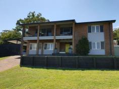  14 The Yardarm Corlette NSW 2315 $720,000 to $740,000 Situated on the high side of one of Corlette's most sought after streets, this beautifully renovated home has a lot to offer! Excellent presentation inside and out with ultra modern kitchen and bathrooms. Upstairs features the master bedroom and study that could be the 5th bedroom with generous living areas that lead to the extended verandah that overlooks the surrounding district. Downstairs there are 3 more bedrooms, plus the mudroom and another living room, all ready for an extended family or frequent visitors. Besides the attached double carport there's plenty of space to park boats and caravans off street. With Roy Wood Reserve and beach just 600 mts walk away and Salamander Centre and public and private schools nearby. 