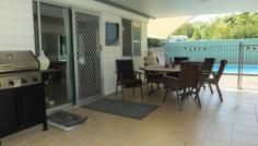  4 Searle Street Bucasia QLD 4750 $325,000 This low-set Queenslander house has two bedrooms with two full bathrooms beside the bedrooms, and a third bedroom for guests. Located in a quiet street with no through traffic and close to the beach, the Bucasia Sailing Club, Kindergarten and Primary School, this is an ideal place to live. Leading in from the front verandah is the combined lounge dining and kitchen for great living. Downstairs through the laundry and storage area is this spacious rumpus / family room that has easy access to the rear entertaining area, the swimming pool on the north side or to the garage / carport on south east. There is also a garden shed at the rear. The two main bedrooms have built-in robes, ceiling fans and split air conditioners, as does the lounge room. Currently tenanted on periodic, inspections by appointment.  