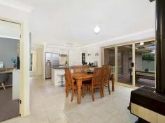  23 Jessica Close Raymond Terrace NSW 2324 $440,000 - $460,000 Ideally located between Maitland and Newcastle, this Raymond Terrace home is perfect for families who love to entertain. On hot summer days you can cool off in the saltwater, inground pool before reclining on the surrounding decking to enjoy a cool drink and a good book. There are also two covered, alfresco entertaining areas suitable for all occasions. The cosy entertaining area located directly off the dining area is ideal for those easy summer barbecues on a balmy night. At the rear of the home awaits a large, covered entertaining area that will cater for many guests should you wish to hold a celebration, party or just have the extended family on the weekend. Inside the brick and tiled roof home awaits a spacious family abode with two living areas, four bedrooms and a home office. It’s perfect for growing families and those who desire a work-from-home option, with the former single garage converted into a comfortable office and separate bedroom. The heart of the home is the centrally located kitchen, which is flanked by the dining area on one side and the large living room on the other.  It’s a smart floor plan that allows each area to be used individually, without ever feeling closed off from the rest of the home. The kitchen features long laminate benches, lots of cupboard space, a large pantry and stainless steel appliances. It overlooks the tiled dining area, where a slow combustion wood heater works to keep you warm and adds a warm, relaxing atmosphere to the home. The living room is also sure to impress with its generous proportions, large picture windows on either side which make it lovely and light and split-system air conditioning for comfort all year round. The master suite lies at the front of the home and features a box bay window, that would work beautifully as a reading corner, while a mirrored triple door built-in robe provides plenty of storage and an ensuite offering an oversized shower. There’s also a split-system air conditioner in the master bedroom. Two of the three remaining bedrooms have built-in robes, while the third, which is attached to the home office, would be great for a teenager or extended family member should you wish to use the office as a retreat or chillout space. The family bathroom has a separate shower and bath, large vanity and strip wall heater. The property is located within walking distance of the beautiful Grahamstown Lake, which has a boat ramp, while other nearby amenities include Grahamstown Public School, parks and local shopping. Raymond Terrace is about a 30 minute drive from Maitland and a 35 minute drive from Newcastle, giving you the option of working in the city but living in the country with an easy commute. SMS 23Jess to 0428 166 755 for a link to the on-line property brochure. Kitchen Walk In Pantry Built In Robes Air Conditioning Pay TV Cable/Sat Dishwasher Pet Friendly Outdoor Entertaining Area Shed Fully Fenced Decking In Ground Swimming Pool Solar Panels Gas Hot Water. 