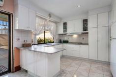  12 Merrilands Road Reservoir VIC 3073 $698,000 Are you caring for your in-laws and would like to offer them their own self-contained area of a home? Here's a property that's been configured to meet that very demand! Designed with the ability to be split in half to offer two separate layouts on a sizeable 814sqm (approx.) allotment, two parties can happily co-exist within the substantial-sized three-bedroom residence in privacy without disrupting the other. However, such is the cleverness behind the design that the two layouts can seamlessly blend together to create one fluid single-level floorplan. In total, two kitchens, three living zones and two bathrooms are on hand to deliver a spacious living experience, while a huge concreted outdoor entertaining area comfortably caters for large-scale gatherings. Occupants will enjoy the benefits of split-system heating and cooling, while a huge four-car garage is a handyman's dream. There's also plenty of scope to modernise the interior to suit your own interpretation of contemporary style. In a desirable location within walking distance of Keon Park train station, William Ruthven primary and secondary schools, Johnston St cafes and parks and minutes away from the Metropolitan Ring Road and Reservoir Village shops. 
