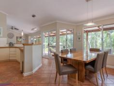  13 Clipson Crescent Mundaring WA 6073 $549,000 Cosseted in an iconic Hills landscape, this bright and light 3 bedroom, 2 bathroom, plus study home is a Noblewood Estate treasure. Tranquil views, a soft-grey façade and the use of recycled materials give the property an aura of serenity. Raked ceilings, open-plan living and a northern aspect, infuse the home with beautiful light. Outdoors, a long, shady verandah overlooks the natural, 2,573sqm block and decked above-ground pool. With a paved driveway, large shed and sought-after address, this home is a private delight. 3 bed, 2 bath plus study 1997 Ross Squires home Light-filled open-plan Great kids’ activity room Decked swimming pool Wisteria strewn pergola Paved driveway carport Private 2573 sqm block Walk Mundaring Primary Desirable Noblewood Est A restrained footprint and judicious use of recycled materials ensure this family home sits lightly on its sought-after Noblewood Estate address. An intelligent floorplan delivers spacious, open-plan living with a mesmerising outlook to the decked pool and towering eucalypts. The central kitchen, flanked by lounge and dining areas, has cream cabinetry and timber trim. Clearly designed for family life, you can stand in the kitchen and see the pool, lounge and activity room. Shaded in summer by a long verandah, the open-plan living area captures the winter sun, ensuring year-round comfort, a slow combustion fire and reverse cycle air-conditioner bolster the climate control while a 1.5kW PV system reduces power costs. The two junior bedrooms open directly to the activity room, creating a fabulous dedicated space for the kids with access to the family bathroom. A European laundry and two large storage cupboards in this ‘busy zone’ help to keep family life under control. Both junior bedrooms have loft beds – currently unused – and wardrobe recesses. This elevated sleeping space could be recommissioned or utilised as additional – and out of sight – storage space. The master bedroom sits at the front of the home and looks out to gardens and recycled brick paths. Direct access to the wisteria covered pergola brings a heightened sense of connection with the landscape. A walk-in wardrobe and ensuite complete the comfortable main bedroom suite. Just inside the front door is the office/study. Built-in desks and shelving fashion a fabulous home office or homework space. Arranged away from the home’s main living zones makes for professional at-home meetings and study time free of distractions. A newly-paved driveway with integrated parking bays makes entering and exiting the property a breeze without affecting the natural setting.  A 6 m x 5.5 m shed – with roller door and concrete pad – offers vehicle storage and space for pottering. Noblewood Estate is a desirable Mundaring enclave; within walking distance of the Mundaring Primary School, the shops and services of the bustling village are within easy reach, so too arterial links to Midland and the Perth CBD. To arrange an inspection of this property or for experienced real estate advice, call Mr Bright – Lee Nangle – 0427 202 366 and take a walk on the bright side. 