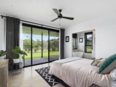  2-14 Acacia Court Beechmont QLD 4211 $870,000 In the heart of Beechmont surrounded by the lush vegetation of the Scenic Rim you will find this contemporary 3.18 acre, one of its kind property.  With a blend of sophistication and elegance this property offers country living with a city feel.  Built to the highest standard, the main residence is architecturally designed with 4 spacious bedrooms, 2 bathrooms and a kitchen any budding cook would love. Also on offer is a huge garage built with the same design as the house, which will fit up to 6 cars. Attached to this is a fully self contained one bedroom dwelling also designed to compliment the features and design of the main house. Other features include: Electric front gates  Fully fenced on all boundaries  Bore with pump up to 2 large in-ground water tanks  Air-conditioners throughout  Marble tiles in bathrooms  Gas cooking  Circular gravel driveway  10m x 8.4m carport / undercover entertaining area  Large windows overlooking views  Gas fireplace  Large laundry 