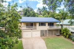  14 Palmway Cl, Woombye QLD 4559 $400,000 Peaceful, private and ready to be yours, this one owner home is located right near the end of the well regarded Palmway Close Woombye.  Very central and conveniently located, just about everything you need is within 5 minutes from home - shopping centres, schools, transport, services.  Featuring quality polished timber floors right through the house and 2 separate living areas - each with its own connecting verandah, the house is spacious and inviting.  The two front verandahs are wonderful spots to enjoy a sunny breakfast on the deck or just relax in the afternoon with a cooling beverage.  Every room offers a lovely natural forest or green garden outlook, with the views from the front directly to a panorama of green vegetation - a very calming view to enjoy everyday.  A large, well equipped central kitchen and dining area, with the main bedroom at one end of the home offering good separation from the other two bedrooms.  Split system air conditioning throughout the home ensures cool comfort in the summer.  Downstairs in this pole home design is a double lock up garage and storage area. This area could also be further dug out to easily create another room or two or a Granny Flat if desirable.  The block size is 752 square metres, plenty of room in the backyard for vegie gardens and to plant fruit trees if you wish.  It has been a wonderful family home for the past 15 years to the current owner - here's your chance to 'get into the market' and make it your own.  Inspections are most welcome - please contact Kirk Patrick at Riddell Real Estate Woombye.  