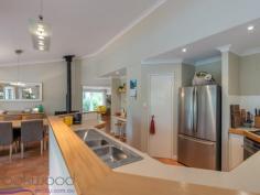  13 Clipson Crescent Mundaring WA 6073 $549,000 Cosseted in an iconic Hills landscape, this bright and light 3 bedroom, 2 bathroom, plus study home is a Noblewood Estate treasure. Tranquil views, a soft-grey façade and the use of recycled materials give the property an aura of serenity. Raked ceilings, open-plan living and a northern aspect, infuse the home with beautiful light. Outdoors, a long, shady verandah overlooks the natural, 2,573sqm block and decked above-ground pool. With a paved driveway, large shed and sought-after address, this home is a private delight. 3 bed, 2 bath plus study 1997 Ross Squires home Light-filled open-plan Great kids’ activity room Decked swimming pool Wisteria strewn pergola Paved driveway carport Private 2573 sqm block Walk Mundaring Primary Desirable Noblewood Est A restrained footprint and judicious use of recycled materials ensure this family home sits lightly on its sought-after Noblewood Estate address. An intelligent floorplan delivers spacious, open-plan living with a mesmerising outlook to the decked pool and towering eucalypts. The central kitchen, flanked by lounge and dining areas, has cream cabinetry and timber trim. Clearly designed for family life, you can stand in the kitchen and see the pool, lounge and activity room. Shaded in summer by a long verandah, the open-plan living area captures the winter sun, ensuring year-round comfort, a slow combustion fire and reverse cycle air-conditioner bolster the climate control while a 1.5kW PV system reduces power costs. The two junior bedrooms open directly to the activity room, creating a fabulous dedicated space for the kids with access to the family bathroom. A European laundry and two large storage cupboards in this ‘busy zone’ help to keep family life under control. Both junior bedrooms have loft beds – currently unused – and wardrobe recesses. This elevated sleeping space could be recommissioned or utilised as additional – and out of sight – storage space. The master bedroom sits at the front of the home and looks out to gardens and recycled brick paths. Direct access to the wisteria covered pergola brings a heightened sense of connection with the landscape. A walk-in wardrobe and ensuite complete the comfortable main bedroom suite. Just inside the front door is the office/study. Built-in desks and shelving fashion a fabulous home office or homework space. Arranged away from the home’s main living zones makes for professional at-home meetings and study time free of distractions. A newly-paved driveway with integrated parking bays makes entering and exiting the property a breeze without affecting the natural setting.  A 6 m x 5.5 m shed – with roller door and concrete pad – offers vehicle storage and space for pottering. Noblewood Estate is a desirable Mundaring enclave; within walking distance of the Mundaring Primary School, the shops and services of the bustling village are within easy reach, so too arterial links to Midland and the Perth CBD. To arrange an inspection of this property or for experienced real estate advice, call Mr Bright – Lee Nangle – 0427 202 366 and take a walk on the bright side. 