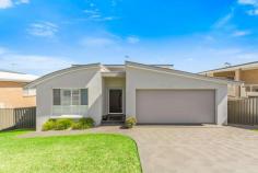  20 Brooks Terrace  Kanahooka NSW 2530 $810,000 - $860,000 Situated in a great part of Kanahooka is this large family home. Featuring 4 generous bedrooms, main bedroom with ensuite & WIR, a designer kitchen with quality appliances and island bench, spacious open plan living and dining area which flows out to the entertaining deck which takes in views towards the lake . Downstairs you are welcomed by the second living space, main bathroom and you venture outside to another alfresco entertaining area overlooking the large child friendly yard. Located just moments to the lake foreshore , walking tracks, shops, schools and transport this home is sure to impress the growing family. FEATURES: Air Conditioning Built-In Wardrobes Close To Schools Close To Shops Close To Transport Garden. 