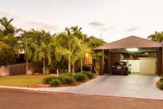  7 Celtic Loop Cable Beach WA 6726 $720,000 This Sunset Rise home is the ultimate in low maintenance living in an amazing location. A quiet street only a short stroll to Cable Beach, cafes and restaurants creates that holiday feel all year round. The house is surrounded by immaculate reticulated gardens and timber decks which add to the tropical feel. The double carport to the front and access to the rear yard create an ideal lock up leave option or family home. As you enter the property via the front deck you are met with a neat tiled entry way and long hallway which widens out to the bar, open plan living, kitchen and dining area with doors leading to the deck and pool area. The kitchen features granite benchtops and Tasmanian oak cabinetry with a great sized breakfast bar and island bench adding to the functionality. The dining area is situated between the kitchen and living areas and features a built-in bar area with stone features and a timber top. All four bedrooms are great sizes with built in robes to the master and two rear bedrooms. Air-conditioning, fans and tiles throughout perfect for those hot Broome days! The ensuite is well appointed with spacious shower, vanity and toilet. The main bathroom with bath is accessible from the hallway and one of the bedrooms, great for every day living and guests. One of the rear bedrooms has direct access onto the back deck and pool area creating an even more open, breezy feel. Riverstone, bamboo panelling and reticulated gardens to the rear yard give the area a natural look whilst being very low maintenance. The swimming pool has a large deck to one side adjoining the indoor living area PLUS another seating area in a bali-style gazebo at the end of the pool within the fenced area. Great for having a drink with friends or relaxing while the kids swim! The home has been lived in by the current owners for some time so is immaculately cared for and will be available to move into upon settlement. For further property details or to arrange a private inspection please contact Naomi Scarlett on 0401 625 526 or email naomi.scarlett@raywhite.com FEATURES: Air Conditioning Built-In Wardrobes Close To Schools Close To Shops Close To Transport Pool. 