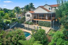  35 Timbertops Dr, Coffs Harbour NSW 2450 $995,000 Set amongst prestigious homes and just minutes walk to one of our regions best surfing beaches, this stunning family home is sure to impress. 3 spacious living areas provide a choice between formal or relaxed living and the elevated entertaining deck over looks the sparkling in-ground saltwater pool and established private gardens. The home chef will appreciate a well eqquipped kitchen complete with stone benchtops, glass splashback, gas cooking and loads of storage. This area forms the central hub of the home and flows to both the dining and living room with polished timber floors and high ceilings. The upper level is a genuine parents retreat boasting an oversize master bedroom, ensuite with spa bath and dual shower, plus a living room and sun deck all with ocean views. This is the prefect spot to unwind and relax away from the kids. Each of the 5 bedrooms feature reverse cycle air conditioning, large built in robes and are smartly positioned to provide privacy and easy access to the main bathroom. The man of the house will rejoice at the huge 4 car garage, plus there's a dedicated parking pad for your trailer with a secure gate. 