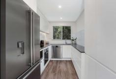  3/300B Burns Bay Road  Lane Cove NSW 2066 $700,000 Set in the sought-after 'Parkway' complex, this sizeable two-bedroom apartment delivers a lifestyle of unrivalled luxury. Recently renovated to showcase a seamless in/outdoor flow with open living and high-calibre European appointments, it embraces leafy water views from its private balcony. The ultra-convenient setting is mere footsteps to the waterside of Burns Bay, bus services and just moments to Lane Cove's vibrant shopping precinct. Open plan living/dining with full-length sliding glass doors Galley-style kitchen with stainless steel appliances, pantry, stone benchtops, high-gloss polyurethane cabinetry Sweeping full-length balcony with alfresco dining area Built-in robes and plush carpet in both bedrooms Luxury floor-to-ceiling tiled bathroom with stone vanity, frameless rain shower and separate bath Stylish timber floors in the living areas, internal laundry Ducted reverse cycle air conditioning, intercom entry Security parking plus storage cage Steps from city and Chatswood buses, walk to Fig Tree village shops, moments to Hunters Hill and Lane Cove Village. 