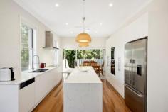  79 Clovelly Road Randwick NSW 2031 $2.5m Newly Renovated Family Home On 335sqm, A Perfect Fusion Of Form, Function And Flair Contemporary design and family functionality unite in this wide-fronted Federation semi to deliver a perfect environment for relaxed living and entertaining on the border of Randwick and Clovelly. Freestanding to the north, the newly renovated five-bedroom home's stylish interiors embrace the outdoors with bright open living space extending to an all-weather entertainer's terrace and deep leafy garden. A considered design and well conceived layout offers plentiful room for the growing family with loads of storage space and a master suite overlooking the gardens. Just 100m to Frenchmans Road's village cafes and eateries, this beautifully presented home is ideal for lovers of the great outdoors within easy walking distance of Queens and Centennial Parks and minutes to Bronte and Clovelly Beaches.  * 	 6m frontage with hardstand parking * 	 5 double bedrooms with built-in robes  * 	 Master with a stylish designer ensuite * 	 Carrara marble fish scale mosaic finishes * 	 Fluid open plan living and entertaining * 	 Windows on the north, loads of sunlight * 	 Grey Ironbark floors and pendant lighting * 	 Chef's grade Caesarstone gas kitchen * 	 3m breakfast island, NEFF appliances  * 	 Dining with bi-folds to a covered terrace * 	 Leafy established garden with sunny lawn * 	 3 designer bathrooms, main with a bath * 	 Grohe tapware and dual shower heads * 	 3rd bath with custom-fitted family laundry * 	 Pure NZ wool carpeting on the upper level  * 	 Plantation shutters and ceiling fans  * 	 Basement level storeroom with extra W.C. * 	 Sandstone walled cellar, ideal wine cellar * 	 Attic storage plus ample built-in storage . 