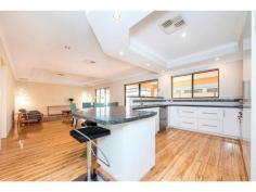  35 Napier Rd Morley WA 6062 $499,900 Spacious 3 or 4 bedroom (bir’s), 2 bath family sized home on totally separate strata block with room to park cars, boat or van off road along with 2 car lock up garage with shoppers entry into home. Features timber look floors, just use a soft duct mop to easily keep clean.  Two separate living rooms including home theatre upfront and open planned, generous kitchen, dining, living room which flows out to massive paved alfresco with outdoor kitchen built-in.  There’s so much room for the family to get together, relax, party or to enjoy their own space with high recess ceilings in living areas, creating atmosphere.  Master bedroom is up front with walk in robe, ensuite, wc and the 2 other bedrooms with (bir’s) and bathroom at the rear.  There’s plenty of space inside and out with nothing to do but move in. Loads of extras including ducted air, security screens and more. Walking distance to bus, shops, parks and easy access to freeway and only 10 klms to Perth CBD. 