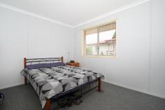  71 Aspinal Street Leichhardt QLD 4305 $249,000 If you are chasing a solid investment property with a great rental yield and even better tenants then look no further!!!!! This solid three bedroom brick home needs no work and has fresh paint throughout as well as new floor coverings in the main living areas. The kitchen is roomy and well appointed with large pantry and new upright gas stove. The lounge room is open plan and leads onto the dining which features large A/C. There is an internal laundry and two of the three bedrooms have built ins. The bathroom is neat and tidy. There is side access to the single lock up shed with workshop and the 607m2block is fully fenced. We have wonderful tenants in place who want to stay long term who are currently paying $270.00 per week.  Located only minute’s walk to public transport, shops, school and pool this really is an investors dream.  