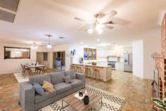  13 Summer Drive Buronga NSW 2739 $449,500 - $493,000 Crafted from recycled red brick and set on a 1216sqm block in a quiet enclave of Buronga, this character home is perfect for a growing family. With a large backyard, sprawling floorplan and outdoor living space, this is a home perfectly crafted those who need room to move. There are four bedrooms, two with built-in closets and the master suite with a walk-in robe and ensuite with twin vanities. There are plenty of living spaces to enjoy including open-plan dining and family room and a living room at the rear of the floorplan. A study is located off the main living space, perfect for those who work from home. When it's time to cater for loved ones, the well-equipped kitchen will impress even the fussiest home chef. Enjoy a 900mm gas cooktop and oven, a large walk-in pantry, breakfast bar and plenty of prep space. Extra features abound and include slow combustion heating, reverse-cycle heating and cooling and a powder room. There is an attached double lock-up garage with additional storage, plus side access to the yard. Step outside to the semi-enclosed alfresco area with a ceiling fan, oven and outdoor toilet for complete convenience and comfort. There's a great-sized backyard for the kids, plus low maintenance gardens. FEATURES: Air Conditioning Built-In Wardrobes Fireplace(S) Formal Lounge Garden Secure Parking Study. 