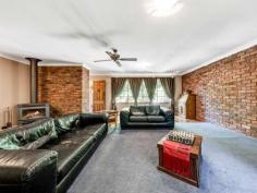  117 High Street Wallalong NSW 2320 $550,000 - $585,000 Set amongst a lush garden oasis brimming with hardy grasses and succulents, towering palms and manicured lawns, this large family home is one of a kind. Packed with charm and rustic ambience, the four-bedroom brick home combines a unique combination of warm country atmosphere with contemporary features. Framed by tall, established trees, the home is on a 1614sqm block with a quaint front porch, with pebblecrete flooring, creating a welcoming and cosy atmosphere in which to arrive at the property. Entry is directly into the spacious living area, which is brimming with country charm.  Contemporary polished floorboards create a stunning first impression and combine beautifully with exposed brick feature walls and a slow combustion fire that’s ideal for chilly winter days spent warm and toasty indoors. The flooring merges to carpet in the sitting area of the living room and this offers both extra comfort and a modern edge to the decor, which marries beautifully with the natural light flooding in the large picture window. Soaring raked ceilings are a stunning feature of this home and they shine in the open-plan kitchen and dining room, where today’s appliances combine with slate-look flooring and timber cabinetry to create a practical yet eye-catching cooking and meals area. The kitchen has a 900mm, stainless steel Smeg oven, large pantry and lots of bench and cupboard space while French doors open off the dining area to the peaceful outdoor entertaining area. A natural pergola, exposed timber is covered with lush foliage to create a shady, cool entertaining area with a built-in barbeque. There is also an enclosed entertaining room with concrete flooring and access to a covered deck for entertaining and upstairs awaits a wonderful loft. Boasting timber floorboards and wall panelling, the loft has soaring raked ceilings and lots of natural light flooding in the series of large windows. The space is ideal for those that work from home or as a teenager’s retreat, with a split system air conditioner keeping the temperature perfect in every season. In the hot summer months you can also enjoy a dip in the inground pool, which is surrounded by lush gardens and is very private. Four generous bedrooms, all with built-in robes, await, with the master suite also boasting an ensuite and the other rooms sharing the family bathroom with its bath and separate, open shower with detachable shower head. Other features of this stunning property include a double garage with drive through access, a chicken coop and garden shed. All of this is just a 15-minute drive from all Maitland has to offer, including excellent schools, medical facilities and shopping. SMS 117High to 0428 166 755 for a link to the on-line property brochure.  Kitchen Rumpus Room Built In Robes Verandah Floorboards High Ceilings Air Conditioning Dishwasher Pet Friendly Courtyard Outdoor Entertaining Area Fully Fenced In Ground Swimming Pool Electric Hot Water. 
