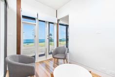  221 Mitchell Street Stockton NSW 2295 With only two streets in Newcastle offering unobstructed beachfront locations, rarely does the opportunity arise to purchase such a unique lifestyle property. This outstanding residence, first occupied in 2014 and designed by Sydney Architects May + Swan, with a brief for maximum energy efficiency, wheelchair friendly access and most importantly making the most of the glorious beach views opposite, from Fingal lighthouse to the harbour entrance Just a short 5 minute ferry ride or 20 minute drive from Newcastle's CBD, Stockton has become one of the Region's most sought after lifestyle suburbs with its surf clubs, 8km of level cycleways, the city's largest foreshore parkland, recreational facilities and village like environment. This is an opportunity to own an extremely desirable home, in one of the Newcastle's most liveable suburbs not to be missed. 4 Bedrooms with option for a 5th Main suite presents with ensuite, dressing room and parents retreat/studio/gym area overlooking the ocean. Open plan kitchen with quality European appliances, huge meals area and family/living room with built in library wall and Jetmaster open fireplace. Large separate home theatre or media room which has ability to be split in two Stunning bathrooms, beautifully designed to suit today's lifestyle. Huge laundry with two walls of cupboard storage space. 3 Car lock up internal access garaging with extra high doors and spacious mezzanine storage. Spotted gum hardwood floors and wide hallway doors and floating external decking designed for easy wheelchair accessibility. Three camera security system Four 3000lt rain water tanks and solar hot water system with gas instantaneous back up incorporating twenty solar panels Two spacious timber entertainment terraces including one at the front overlooking the Pacific Ocean. 