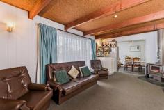  34 Station Street  Koroit VIC 3282 $330,000 - $360,000 Hard to miss at the end of the cul-de-sac, this large family home represents a fantastic opportunity for the buyer looking to purchase a quality established home in a great location. Built in the late 1970's by local building family the McCosh's, this home has stood the test of time. Having just the one owner for its entire existence has ensured the home remains in as good condition today as the day it was built. Comprising of a possible 5 bedrooms, one having the potential of a second living area, a traditional living area with wood fire, large kitchen/dining space, bathroom with shower & bath and laundry. Ahead of its time with a hugely functional layout this home is waiting for its maximum potential to be unlocked. An enormous 1280m2 block provides enough space for extra sheds,entertainment areas and/or room for the kids and pets. Located a short walk from the main street where you'll find supermarkets, bakeries, cafes, milk bars, bookshops, bus stops and more. Or jump in the car and visit the picturesque Port Fairy for one of their magnificent winter weekends or Warrnambool as both are no more than 10 minutes away by car! As a package there is nothing quite like this home in the market so don't risk missing out on this opportunity! 
