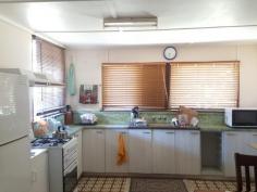  1 Montrose Street OGMORE QLD 4706 $135,000 Cladded home nestled in the small town of Ogmore – Peace and Quiet. Very breezy spot on a large corner block – Plenty of room. Well maintained property with 3 bedrooms and sunroom. Why not get away from it all? This package Includes: Lockable laundry room upstairs. Spacious open kitchen with plenty of cupboards. High carport – can fit RV or caravan, plus another work shed. 3 x water tanks. 2 rain and 1 town. Most aluminium sliders – nothing blocking the cool breeze. 1533m2 sized corner block. WIFI available. PLUS most furniture and whitegoods can remain – Fridge, Beds, Washing machine, Cupboards. Vendor committed elsewhere… School bus service availability. 