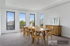  1 BIRCH STREET MOUNT WAVERLEY VIC 3149 Custom designed and individually built on an elevated north-facing block, this stylish and prestigious family home situated within only a short stroll to Mount Waverley Secondary College, Shops and Railway Station offers multi-zoned living, easily accommodating a large family while at the same time ensuring privacy for all.  Featuring lavish formal and relaxed living zones with an open floor plan and surrounded by a northerly garden aspect creating an inside/outside aura.  This residence features five bedrooms, all with private ensuites, and walk in robes (master bedroom downstairs) and a luxurious second Master suite upstairs, with an opulent separate bathroom. Other rooms includes a teenager's private retreat/ library and study nook wired for computers upstairs and whilst downstairs offers a fitted-out home office with built in bookshelves, ideal for those working from home. Those who love to cook would be delighted with the gourmet kitchen fitted with superb stone bench tops, butler's pantry, expansive island preparation area, with dual Miele appliances to suit the finest chef at heart. Flowing from the casual meals area is a fully appointed alfresco outdoor living room, boasting a gorgeous cedar lined ceiling, tiled floor, a natural gas barbeque, sink, stone bench top and storage cabinets all overlooking a beautifully landscaped, low maintenance garden to complete your entertaining needs. A spacious laundry with direct access to the 3 car garage is fitted with double internal drying cabinets, laundry chute and stone bench tops all opening onto an elevated, outdoor, tiled area overlooking a separate garden setting. You will find all this and more behind the front wrought iron fence with double remote controlled gates that offers security to those who reside. 