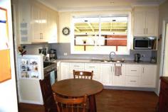  16N Pakington St, Walcha NSW 2354 $340,000 This insulated weatherboard home, circa 1946, has been completely renovated over the past few years. It is situated on a 1068m² block within walking distance of the town centre, the hospital, the bowling club and across the road from the Apsley River walking track. Three large bedrooms, the main with built-ins, are carpeted, while the balance of the house has vinyl timber floor coverings apart from the modern tiled bathroom. A second toilet is located next to the bathroom. The lounge room has ducted gas heating and there are three other gas outlets for heating. The living room, with attached porch, flows through to the dining room that opens onto the large covered outdoor entertainment area. The modern kitchen includes a gas cooktop and space for eating. This leads to the large laundry with storage cupboards.  Manicured gardens lead to the double carport and double garage that has power and a workshop area. There are two garden sheds, one with a paved nook and two aviaries. The gas appliances and the gas hot water are connected to 210 litre refillable gas bottle.  