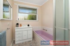  2 Glasgow St, Wendouree VIC 3355 $295,000 This neatly maintained brick veneer classic welcomes a retro uplift, a sympathetic renovation or vision for a new home (STCA) in this desirable pocket of Wendouree. Light & spacious, this single level home features a side entry, a sun kissed living room with gas heater, a split system and ceiling fan, glass doors to the meals area and an original kitchen with good storage above & below the preparation bench. There are three bedrooms, a central bathroom with separate toilet and an internal laundry. An ideal investment or for a first home buyer, this welcoming floor plan & sizable allotment with established gardens offers a single lock up garage, a single carport, a handy garden shed, room for off street parking and a low maintenance garden if considering an investment property. Rent appraised between $270 - $295 per week, this 70's home could increase its rental value with further improvement or a contemporary makeover. Glasgow Street sits within metres to the basketball, badminton and sport centre, while also providing proximity benefits to Stockland's shopping centre, schools, further recreational facilities and the Western freeway. 