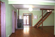  21 Elizabeth Ave, Uralla NSW 2358 $460,000 Situated on approximately 6070m², this classic three bedroom weatherboard home is just 500 metres from the main shopping area. The land is a mixture of cottage gardens, maintained creek land open lawns. The house was fully renovated in recent years and features polished floors and French doors leading out to sunny decks and an in-deck swimming pool.  The main bedroom adjoins a dressing room (or office) while the third bedroom is situated in the large attic. The open plan living and dining area includes a slow combustion wood heater. The modern kitchen includes an electric and wood stove as well a washing machine. The home is fully insulated. Other improvements include a studio with access to Maitland Street, a carport with storage area and a tree house. The gardens are home to various relaxing sitting areas and a stone creek crossing to the studio.  