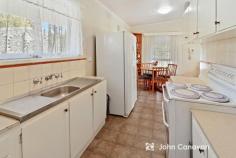  14 Curia Street Mansfield VIC 3722 $445,000 Wander to the shops from this easy-maintenance home, ideal for investors or downsizers, in a central Curia Street location – walking distance to everything! * Charming & immaculately presented home on a large 621m2 allotment * Securely fenced, with lovely undercover front and rear verandahs * Beautiful garden setting – roses, natives, perennials, all well established * Comfortable open plan living/dining and kitchen with gas heater & A/C * Natural light fills the 3 good sized bedrooms, master offering BIR’s * Central bathroom with bathtub, laundry plus additional separate W/C * Secure rear yard featuring lock-up garage with concrete floor & power * Additional garden storage, plus plenty of space to potter around or play! * A rare opportunity – much loved by the current owners for over 20 years. 