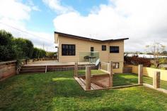  15 Ashburner Street Devonport TAS 7310 $295,000 A must to inspect! Located on the corner of Drake and Ashburner, this home has been beautifully renovated throughout. This North facing sun catcher has open plan lounge, with Panasonic revered cycle air conditioner. The dining and kitchen has stainless appliances comprising Omega under bench oven and bench plates, I-Life stainless range hood plus dishwasher. Privacy is assured with several Pittosporum trees along the full length of the northern boundary, providing an array of green foliage. The angular yet flowing deck provides perfect entertaining for family and friends whilst overlooking the multi-level gardens. Single Garage with roller door/workshop. With Reece High School and Miandetta Primary and Central business district only a few minute’s drive from the property. The property is currently tenanted at $320 a week until September 2019 with excellent tenants whom would love to stay long term. Inspections by appointment. 