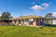  83 Richards Farm Road Staverton TAS 7306 $400,000 You'll be astounded by the 360 degree views from this home. If you are after privacy on your own hobby farm this property is all you need. The three bedroom brick veneer homestead sits on an elevated position with a little over 49 acres surrounding it. The home has been completely renovated including bathroom, floor coverings, blinds, down lights, plaster, paint, new rain water tanks and a new pump. The cosy wood heater warms the completely renovated home with ease because of the brand new double glazed windows. There is ample water on the property with a newly constructed dam, bore water feeding troughs in three paddocks and two new 22,000 litre water tanks. Boundaries are secure with new ring lock and barb fences erected around seven years ago. There's a new driveway and driveway fencing and the paddocks have been fertilised. There are a few implement sheds and there has been a new enviro septic system put in place. Previously used to grow potatoes, berries and grazing the land would have a multitude of uses. 