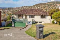  35 Stratton Avenue Lenah Valley TAS 7008 $549,000 This solid constructed family home is located in a tightly held enclave and offers spacious accommodation over two levels. This home certainly makes for easy living with polished floor boards and north facing living zones consisting of lounge room that flows either to the front patio or to the formal dining, that also has access to a fabulous deck that wraps around the rear of the home that displays expansive views of the valley, Derwent River and Mount Wellington. The updated kitchen is of generous proportion with modern style and the latest appliances with a large oven, induction cooktop, soft touch drawers and dishwasher making this an exceptional space of this beautiful home. Flowing through the hallway are three bedrooms, the master bedroom with built-in and ensuite, along with another two bedrooms with built-ins. The main bathroom has a separate shower and bath and is located near the bedrooms making it ideal and practical. Downstairs is deceptively spacious with a large laundry, powder room, garage and loads of storage rooms. The backyard also provides a large concrete BBQ area - ideal for those lazy afternoons and family get togethers. Lifestyle is about choice and this home presents great value and loads of space. Positioned only ten minutes from Hobart CBD, close to schools and bus route this could be just what you have been looking for. 