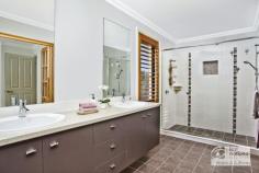  4 Charles Street Baulkham Hills NSW 2153 Light-filled rooms, superior inclusions and a most convenient location place this young, freshly decorated and beautifully presented family residence is in a class of its own. Just 2 minutes' walk from the express bus service to Sydney CBD and within walking distance of nearby shopping centres, this quality-built home has so much to offer. Greeting visitors with a large elegant entry foyer leading to a well-designed floor plan offering expansive living and dining options for both official and casual entertaining that include formal lounge and dining, an everyday meals area, a family room and a rumpus leading out to alfresco entertaining areas . . . spaces that are sure to be enjoyed by every family member and create many memorable occasions with the best of friends. Of special note is the luxury Kitchen equipped with quality appliances, large stone benchtop with breakfast bar, 900mm gas cook top, plenty of storage and a walk-in pantry. On the upper level you'll discover five bedrooms serviced by two luxurious bathrooms both with 'his n her' vanity including the ensuite with a twin shower to the large master. Other features include stunning timber floors, ducted reverse cycle air conditioning, ducted vacuum, alarm, a big study/home office, a guest's powder room, 'Juliet' Balcony off the main bedroom) 3 car garaging (1 with drive through), wide side access and the convenience of a circular driveway. So much to see . . . BE FIRST!  - 5 bedrooms  - Study  - Rumpus  - Family  - Alfresco areas  - Ducted air conditioning  - Alarm  - Ducted vacuum  - 3 car garage  - Side access  - Walk to bus  - Walk to shops. 