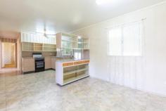  25 Graffunder Street South Mackay QLD 4740 $239,000 This solid 3 bedroom home will have you questioning all your real estate options. Renovate to stay, flip or rent, this South Mackay property presents the home owner or investor a location that appeals to everyone.  With great bones and large 809 SQM block, you have the ability to transform this quant 1970's style build into whatever your heart desires. Good foundations start you ahead of the rest. Step back in time but not in quality.  Entering through the front patio, you will be met with air-conditioned lounge, dining and kitchen. The kitchen is immaculate and has a cool retro feel with plenty of storage. Down the hallway there are 3 large bedrooms all with fans and large windows. The main has a built in and air-conditioning. A separate toilet services the neat and tidy bathroom.  Step down into the spacious laundry where the possibilities are endless! Room for a study, second living or even a second bathroom. Huge fenced front and back yard with one car lockup, Graffunder Street provides the location to invest in your future.  With nearly 40 years in the one family, are you ready to show this home through its next 40? Potentially one of the best decisions you'll make, there are many reasons why 25 Graffunder Street will stand the test of time.  Other features include: - Airconditioned lounge/ dining and kitchen - Neat and tidy retro kitchen with plenty of storage - Main bedroom with built in and air-conditioning  - 2 other large bedrooms- one with built in and both with fans and large windows - Neat and tidy main bathroom with separate toilet - Downstairs laundry with space to renovate and utilise as extra living / study or 2nd bathroom - Big block with shed  - Lockable garage Why make South Mackay your First Choice in Suburbs? Close to airport, Parkside Shopping Centre, Paget, CBD, excellent schools, playing fields, South's Leagues Club, BB Print and Basketball Stadiums, Harrup Park, Beaches and bikeways. This home provides exceptional opportunity in a location that is sought after and convenient. Contact Sales Consultant Leanne Druery for your private inspection. Disclaimer: The Agent does not give any warranty as to errors or omissions, if any, in these particulars, as the provided information from the Vendor can be deemed reliable, but not accurate. Any persons interested in the property should conduct their own research. 