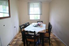  127 Wilmington St Ayr QLD 4807 $79,000 Don't miss this idea opportunity as this low set 1 bedder is perfect for those starting out in the market or looking for that good sized block to build or as a 'rental' which is it's current use and recieving $165 per week... WOW... Priced to please and on a fenced 1012m2 lush town block bragging only minutes away from the CBD, supermarkets and schools... Offering combined kitchen and dining with good sized living area and  one bedroom which is air conditioned... Front enclosed verandah which is also home to the bathroom amenities... Downstairs under the back lean to is the laundry... The yard is fenced and with a handy garden shed and dotted with fruit trees including mango, citrus and passionfruit. Bragging a tremendous amount of room for that colour bond shed and so much more... This one won't last long so hurry and call to arrange your inspection today! FEATURES Verandah Undercover outdoor area Fenced Close to school\ 