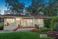  2 YORK STREET GLEN WAVERLEY VIC 3150 $900,000 - $990,000 Situated on 800sqm of land (approx.) and presenting a sweeping broad frontage, this rare parcel of land presents an amazing opportunity for those looking to build their dream home or keen renovators wanting to refresh the existing family home which exudes a hard to find lifestyle in a quiet part of Glen Waverley .  The current residence offers a formal lounge room with an open fireplace. The kitchen and meals area boasts parquetry wood flooring, complimented by the spacious kitchen, adorned with top-of-the-range SMEG cooking appliances.  The family room at the rear of the home provides that sought after feature of a second living space that not only overlooks, but also leads out to a picturesque and inviting backyard, offering a secure playground for children and plenty of paved and decked space for entertaining. All bedrooms are fitted with built in wardrobes and the updated bathroom finishes off what can only be described as great family home. Modern comforts include ducted heating and evaporative cooling.  All within walking distance to Highvale High School, Highvale Primary School, local kindergarten, Larpent Reserve, public transport, Glen Waverley Train Station and The Glen Shopping Centre. 