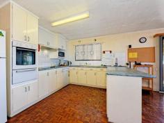  1 Laurel Street Gooburrum QLD 4670 $269,000 If space is on the agenda, this residential home in a rural community is the perfect arrangement to live in comfort and have the feel of open space. 1 Laurel Street, Gooburrum will accomodate the largest of family’s and will be the happy place of many memories to come. Positioned just 8km to Bundaberg CBD, 16km to Moore Park Beach, a beautifully positioned home, which soaks up all the surrounding rural aspect. Consists of four very good size bedrooms, a huge living area with sitting room on entry. There is a large built-in bar combined with the dining, which flows into the kitchen. The bathroom has been recently renovated, designed wheel-chair friendly. The large covered outdoor entertaining area captures beautiful breezes, a nice place to entertain whilst the kids splash in the above ground swimming pool, and you can wash off under the freshwater shower. The fenced 905sqm block is nicely landscaped, all gardens & the front yard equipped with sprinklers to retain a fresh surround. Water will never be a problem, as you have access to an unmetered domestic bore, connected to the residence. A large double lock up garage is attached, which includes a huge workshop space, as well as a double carport off the front. 1 Laurel Street, Gooburrum feature’s:- – Four very generous size bedrooms – Huge lounge room which can be split into two spaces – Built-in bar, dishwasher & pantry in the kitchen – Home is designed wheelchair friendly – Security screens throughout – Air-conditioning to the main living & master bedroom – 2kw solar power system – Remote access to the garage – Above-ground swimming pool with outdoor shower – Garden shed – Treated bore water connected to the home, as well as rain water tank – 905sqm fenced block, garden & yard sprinkler irrigation – 2 toilets – Gooburrum Primary & Bundaberg North school catchment area – 16km to Moore Park Beach, 8km to Bundaberg CBD 