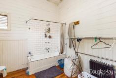  13 Fraser Street Sunshine VIC 3020 $600,000 - $650,000 Situated in an exclusive row of 9 stunning post federation homes Circa 1911 -walking distance to Sunshine Train Station and Hampshire Road on an outstanding 742m2 approx land. This unique position offers affordability, future possibilities and irreplaceable original character prime for renovation. Comprising 3 large bedrooms, spacious living, kitchen with gas appliances, bathroom, toilet and garage. Original features including cornices, rosettes, fire places, lead light glass, double hung windows, 12 foot ceilings and baltic pine timber flooring. **The sensational 742m2 provides huge scope for extension or rear unit development/subdivision subject to council approval.** Note: Currently leased on a monthly tenancy. The property has been updated with concrete foundations and a zinc roof. 